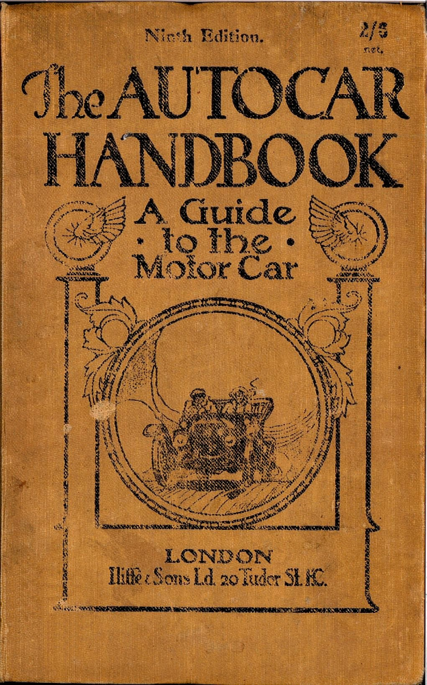 Altes Buch mit dem Titel "The Autocar Handbook: A Guide to the Motor Car" in hellblauem Einband und weißer Schrift, zeigt Gebrauchsspuren auf einer weißen Oberfläche.