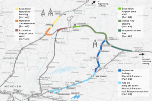 Karte einer Stadt mit einer hervorgehobenen Zugroute von München nach Frankfurt, einschließlich Haltestellen und Details der Umgebung.